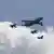В небе берлинского авиасалона военные самолеты эскортируют гражданский "Эрбас"