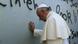 Pope Francis prays while placing his hand on the wall separating the West Bank from Israel Pope Francis prays while placing his hand on the wall separating the West Bank from Israel