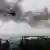 Столбы дыма над аэропортом Донецка (фото из архива)
