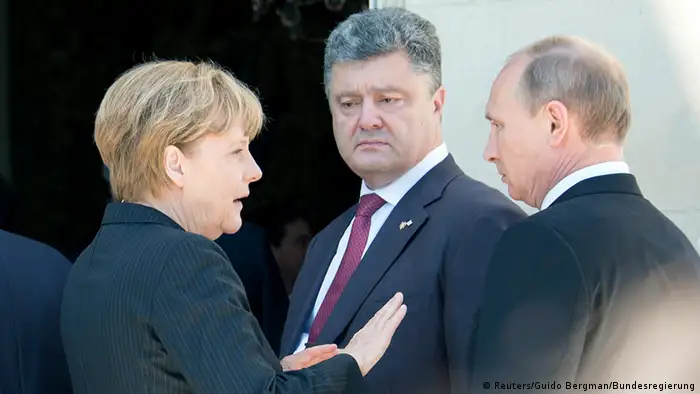 Merkel mit Putin und Poroschenko 06.06.2014 Benouville