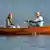 Mini-Gipfel in Schweden Merkel im Boot Symbolbild in einem Boot sitzen