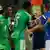 Nigerian players celebrate against Bosnia