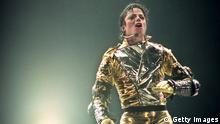 AUCKLAND, NEW ZEALAND - NOVEMBER 10: Michael Jackson performs on stage during is 'HIStory' world tour concert at Ericsson Stadium November 10, 1996 in Auckland, New Zealand. (Photo by Phil Walter/Getty Images)