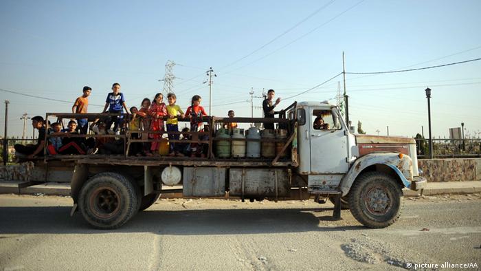 Flüchtlinge verlassen Mossul (Foto: Emrah Yorulmaz - Anadolu Agency)