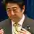 Japan's Prime Minister Shinzo Abe attends a news conference at his official residence in Tokyo June 24, 2014.