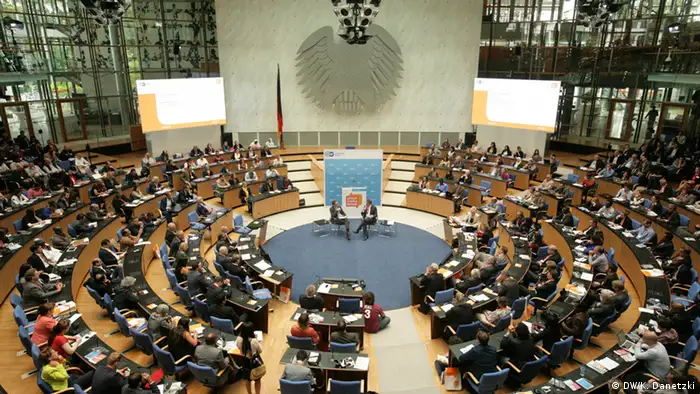 An overhead view of the room in which the GMF is taking place