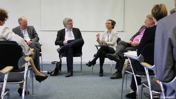 Paneldiskussion Media and Citizenship bei der EADI General Conference 2014 in Bonn. V.l.n.r.: Holger Hank, Patrick Leusch, Pehnleak Chan, Per Oesterlund. (Foto: Charlotte Hauswedell/ DW Akademie).