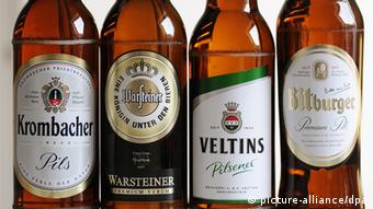 Four bottles of beer from Krombacher, Warsteiner, Veltins and Bitburger, Copyright: Marius Becker/dpa