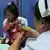 Vaccinating a child Photo: Sanofi Pasteur