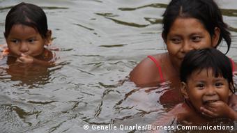 Family in traditionally owned forest, Panama.