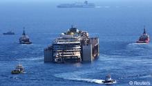 El Costa Concordia es remolcado hacia Génova