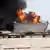 Brennende Treibstofftanks in Libyen (Foto: Reuters).