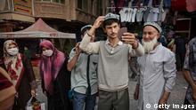 HRW требует наказать Китай санкциями за обращение с уйгурами