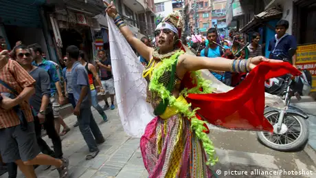 A woman dancing at the Gaijatra festival 