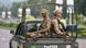 Pakistani soldiers ride in a vehicle as they patrol in a 'red zone' area of Islamabad on August 13, 2014, ahead of the country independence day and proposed protest marches by opposition parties against government (Photo: AAMIR QURESHI/AFP/Getty Images) Pakistani soldiers ride in a vehicle as they patrol in a 'red zone' area of Islamabad on August 13, 2014, ahead of the country independence day and proposed protest marches by opposition parties against government (Photo: AAMIR QURESHI/AFP/Getty Images)