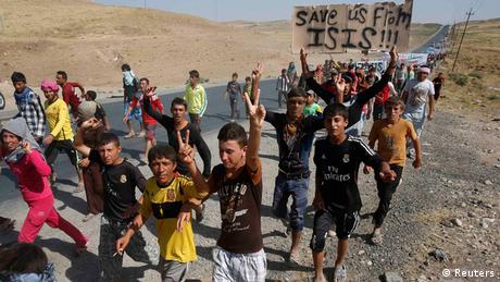 Flüchtlinge IM Nordirak fordern Schutz vor IS-Milizen. Foto: REUTERS/Youssef Boudlal 