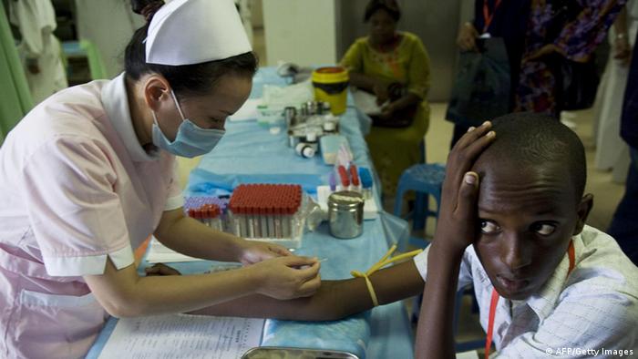 A doctor attending to a Kenya patient