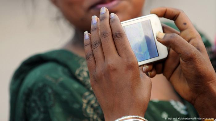 Woman's hands holding a smartphone