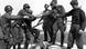 Soviet and US soldiers shake hands on a bridge on the Elbe River in 1945 Soviet and US soldiers shake hands on a bridge on the Elbe River in 1945