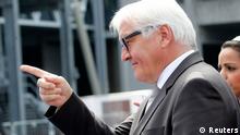 Federal Foreign Minister of Germany Frank-Walter Steinmeier gestures as he arrives for an informal meeting of the EU Foreign Affairs Ministers in Milan August 29, 2014. REUTERS/Alessandro Garofalo (ITALY - Tags: POLITICS)