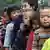 China Schulkinder Kinder Grundschulalter Wanderarbeiter Symbolbild