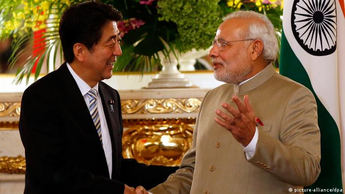 India's Prime Minister Narendra Modi (R) and Japan's Prime Minister Shinzo Abe shake hands before their talks at the state guest house in Tokyo, Japan, 01 September 2014 (Photo: EPA/TORU HANAI / POOL +++(c) dpa - Bildfunk+++)