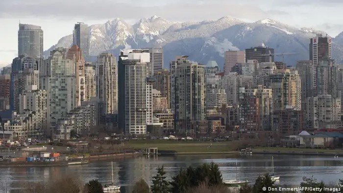 The Vancouver skyline with snow capped mountains in the background (Don Emmert/AFP/Getty Images)