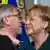 Juncker mit Merkel ARCHIVBILD 2013