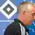 Mirko Slomka, Trainer des Hambuger SV, geht an HSV-Logo vorbei (Foto: dpa)