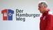 Fußball - HSV Trainer Mirko Slomka geht an einer Werbung "Der Hamburger Weg" vorbei (Foto: dpa) Fußball - HSV Trainer Mirko Slomka geht an einer Werbung "Der Hamburger Weg" vorbei (Foto: dpa)