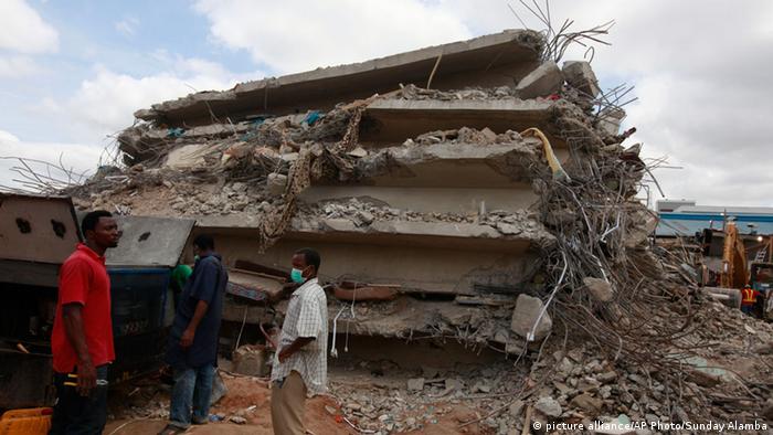 Rescue workers search for survivors in the rubble of a collapsed building belonging to the Synagogue Church of All Nations in Lagos, Nigeria