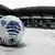 A soccer ball lays in the snow at MSV Duisburg's stadium