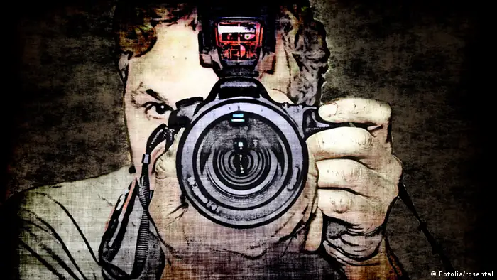 Paparazzo Fotograf Symbolbild
