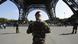 Paratroopers patrols under the Eiffel Tower on September 23, 2014 in Paris, a day after the radical Islamic State group, which controls large areas of Iraq and Syria, called on Muslims to kill citizens of countries taking part in the US-led coalition against the jihadists, which includes France. AFP PHOTO LIONEL BONAVENTURE Paratroopers patrols under the Eiffel Tower on September 23, 2014 in Paris, a day after the radical Islamic State group, which controls large areas of Iraq and Syria, called on Muslims to kill citizens of countries taking part in the US-led coalition against the jihadists, which includes France. AFP PHOTO LIONEL BONAVENTURE