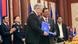 Australia's then Immigration Minister Scott Morrison (centre, L) exchanges documents with Cambodian Deputy Prime Minister and Interior Minister Sar Kheng (centre, R) after a signing ceremony between Cambodia and Australia relating to the settlement of refugees, at the Interior Ministry in Phnom Penh September 26, 2014. Australia's then Immigration Minister Scott Morrison (centre, L) exchanges documents with Cambodian Deputy Prime Minister and Interior Minister Sar Kheng (centre, R) after a signing ceremony between Cambodia and Australia relating to the settlement of refugees, at the Interior Ministry in Phnom Penh September 26, 2014.