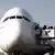 Airbus plane, with passengers disembarking
