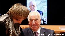 Former German chancellor Helmut Kohl and his wife Maike Richter-Kohl (L) promote his book during a visit to the book fair in Frankfurt October 8, 2014. The world's largest book fair runs from today to October 12. REUTERS/Ralph Orlowski (GERMANY - Tags: POLITICS MEDIA ENTERTAINMENT BUSINESS HEADSHOT)