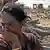 A Sri Lankan woman cries after her home was wrecked in the tsunami