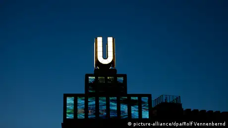 The U lit up on the top of the former Union brewery building in Dortmund. 