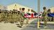 Britische Soldaten falten die Flagge Großbritanniens zusammen (Foto: dpa) Britische Soldaten falten die Flagge Großbritanniens zusammen (Foto: dpa)