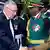 Guy Scott shaking hands with military officials in Zambia
