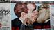 mural with Brezhnev and Honecker kissing, tourist mural with Brezhnev and Honecker kissing, tourist