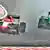 Die Autos von Marussia (l.) und Caterham (r.) beim Rennen in Suzuka (Foto: dpa)