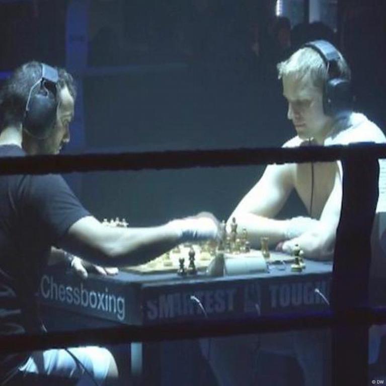 Chessboxing, boxing and chess board game being played alternately