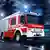 Deutschland Feuerwehr im Einsatz Auto mit Blaulicht