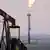 A derek pumps in an oil field