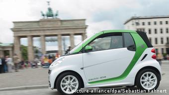 e-car in front of Berlin's Brandenburg Gate