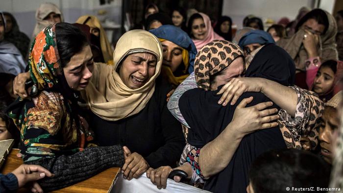 Women mourn their relative Mohammed Ali Khan, 15, a student who was killed during an attack by Taliban gunmen on the Army Public School, at his house in Peshawar December 16, 2014 (Photo: REUTERS/Zohra Bensemra)