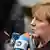 Анґела Меркель спілкується з пресою по прибутті до Брюсселя