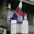 Български флаг, издигнат на един балкон